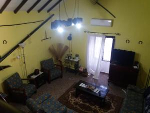 A television and/or entertainment centre at Casa Rural LA ASOMADA