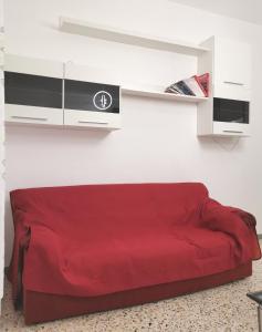 Televízia a/alebo spoločenská miestnosť v ubytovaní Casa Ariete 2