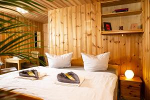 Postel nebo postele na pokoji v ubytování Pension Haus Fürstenberg
