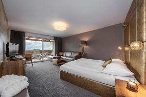 Postel nebo postele na pokoji v ubytování Hotel Sunnwies