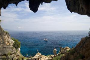 a view of the ocean from a cave at Costa Dorada in Cala Gonone