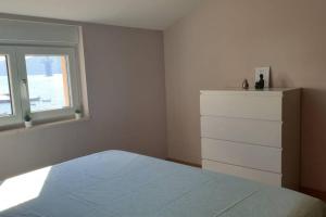 Postel nebo postele na pokoji v ubytování Apartment Mustapic - Perfect view, first row, possibility of fishing