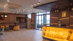 A kitchen or kitchenette at Aparthotel Paradiso