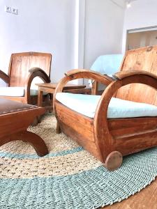 Postel nebo postele na pokoji v ubytování Bale Bingin Beachfront Stay