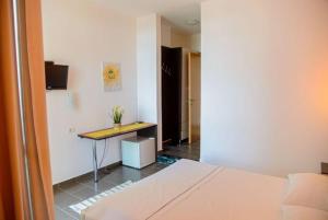 Postel nebo postele na pokoji v ubytování Hotel Aurora + 32 fotografií