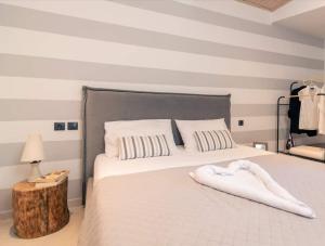Ένα ή περισσότερα κρεβάτια σε δωμάτιο στο Zakynthos Flower of the East City house/aprtm