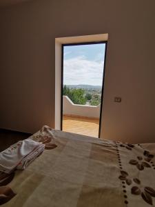 Postel nebo postele na pokoji v ubytování Hotel Bora