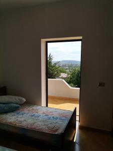 Postel nebo postele na pokoji v ubytování Hotel Bora + 14 fotografií