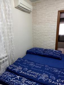Un ou plusieurs lits dans un hébergement de l'établissement Квартира на Кирова