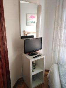 TV a/nebo společenská místnost v ubytování apartamento gran Vía