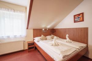 Posteľ alebo postele v izbe v ubytovaní Francis SPA HOTEL