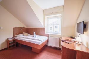 Posteľ alebo postele v izbe v ubytovaní Francis SPA HOTEL