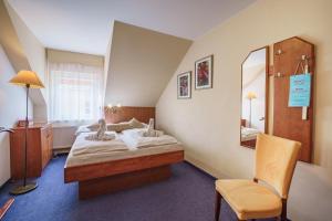 Posteľ alebo postele v izbe v ubytovaní Francis SPA HOTEL