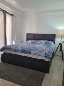 Een bed of bedden in een kamer bij Apartman Dalmatia