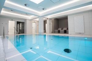 Bazén v ubytování ASTORIA Hotel & Medical Spa nebo v jeho okolí