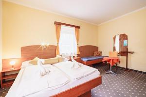 Posteľ alebo postele v izbe v ubytovaní Francis SPA HOTEL