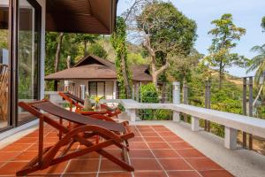 Балкон или терраса в Baan Krating Phuket Resort -SHA Plus