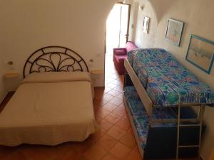 En eller flere senge i et værelse på stupenda casetta in centro storico