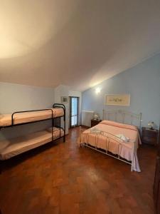 A bed or beds in a room at Al Vecchio Camino