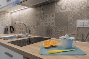 Kuchyň nebo kuchyňský kout v ubytování Margaritari Apartments + 37 fotografií