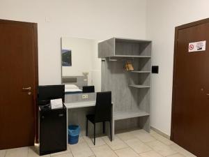 Kuchyňa alebo kuchynka v ubytovaní Hotel Alessander