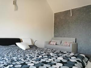 Postel nebo postele na pokoji v ubytování PALMandre (Pag Apartment Luxurious)