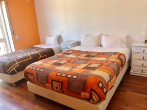 Uma cama ou camas num quarto em Alojamento Local S. Bartolomeu