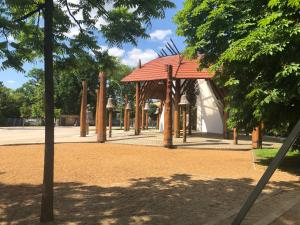 A garden outside Attila Studio Apartments