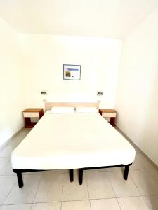Кровать или кровати в номере Residence Palm Garden