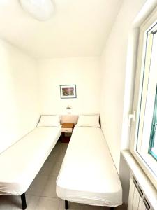Кровать или кровати в номере Residence Palm Garden