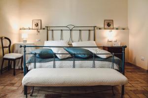 Säng eller sängar i ett rum på Masseria del Vino