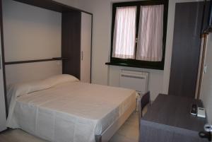 Postel nebo postele na pokoji v ubytování B&B L'Acero