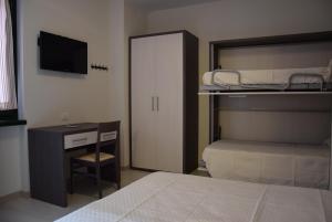 Postel nebo postele na pokoji v ubytování B&B L'Acero