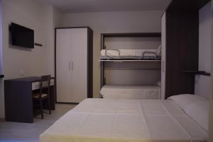Postel nebo postele na pokoji v ubytování B&B L'Acero