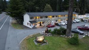 an aerial view of a hotel with a parking lot at Hiouchi Motel in Crescent City