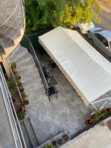 an overhead view of a staircase with a white awning at Vila Angi in Mangalia