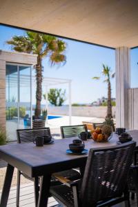 Gallery image of Arcadia Eco-Luxe Mobile Homes with infinity pool by OIKO Collection in Privlaka