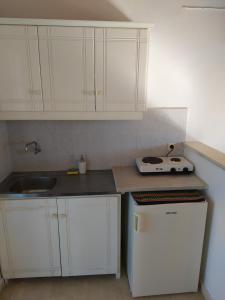 Η κουζίνα ή μικρή κουζίνα στο Apartment by central Tsilivi beach +5 φωτογραφίες