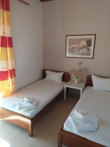 Ένα ή περισσότερα κρεβάτια σε δωμάτιο στο Apartment by central Tsilivi beach