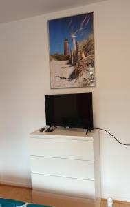TV a/nebo společenská místnost v ubytování Riposo