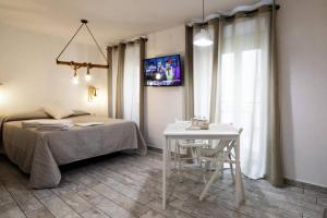 Ένα ή περισσότερα κρεβάτια σε δωμάτιο στο Vivienda turística Lagarto de Jaén