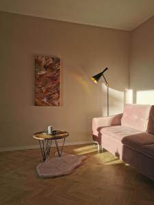 Et opholdsområde på Cosy Old Town Apartment