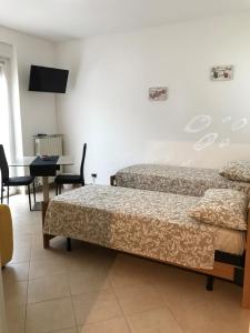 Posteľ alebo postele v izbe v ubytovaní B&B La Terrazza + 37 fotografií