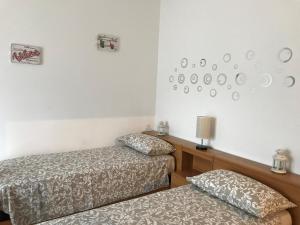 Posteľ alebo postele v izbe v ubytovaní B&B La Terrazza