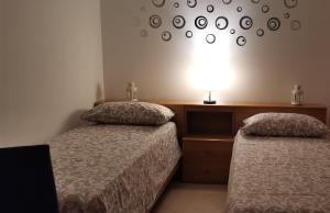 Posteľ alebo postele v izbe v ubytovaní B&B La Terrazza