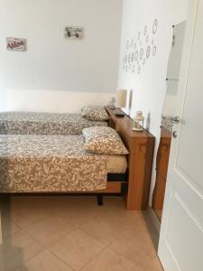 Posteľ alebo postele v izbe v ubytovaní B&B La Terrazza