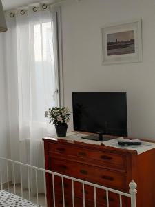TV a/nebo společenská místnost v ubytování Venice Home