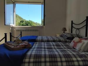 Posteľ alebo postele v izbe v ubytovaní Anthony House