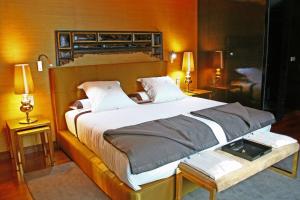 Кровать или кровати в номере Gran Hotel Nagari Boutique & Spa
