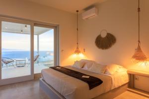 Postelja oz. postelje v sobi nastanitve Iliades Luxury Boutique Suites